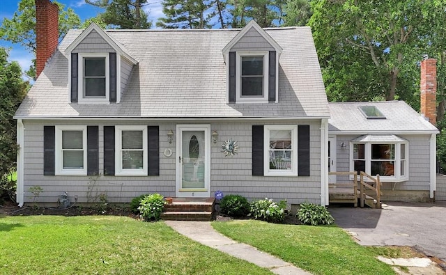 8 Shepard Ave, Pembroke, MA 02359 - cape cod-style house with a chimney and a front yard