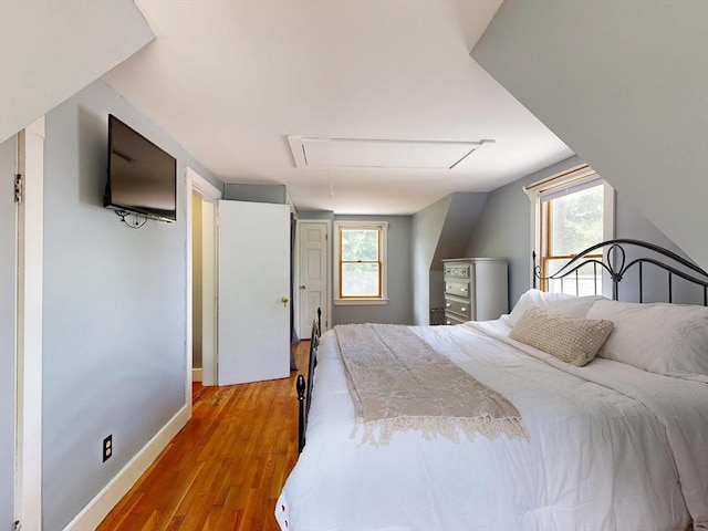 8 Shepard Ave, Pembroke, MA 02359 - bedroom featuring attic access and light wood finished floors