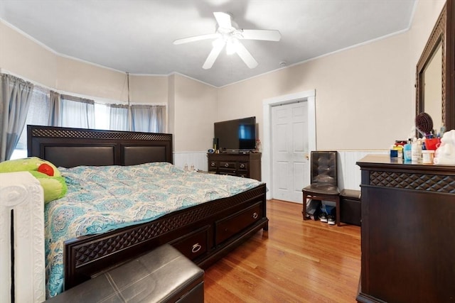 bedroom featuring ceiling fan and light hardwood / wood-style floors