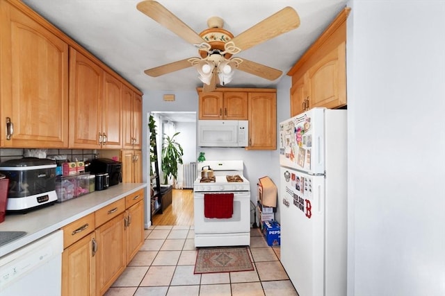 kitchen featuring white appliances, ceiling fan, and light tile patterned flooring