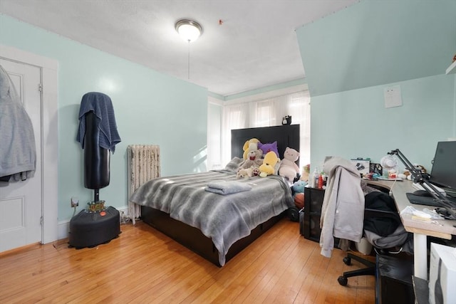 bedroom with light wood-type flooring