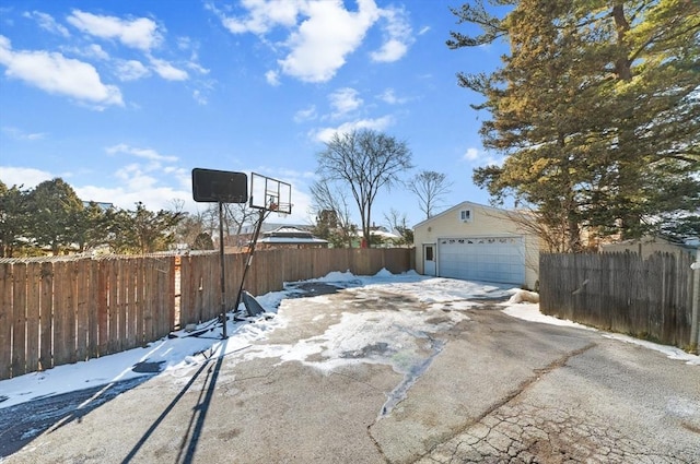 exterior space with a garage and an outdoor structure