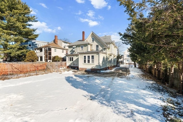 view of snow covered property