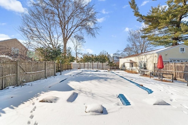 view of yard covered in snow