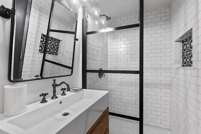 121-123 Beach St Unit 603, Boston, MA 02111 - full bathroom with a tile shower and vanity