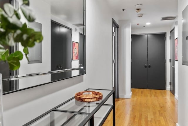 121-123 Beach St Unit 603, Boston, MA 02111 - hall with light wood-style floors, baseboards, and recessed lighting