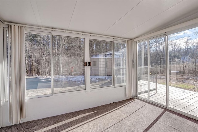 unfurnished sunroom with a wealth of natural light