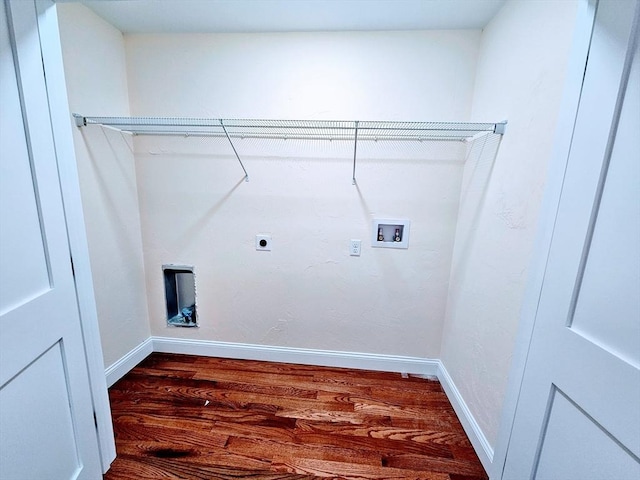 clothes washing area featuring hookup for a washing machine, dark wood-style flooring, electric dryer hookup, and baseboards