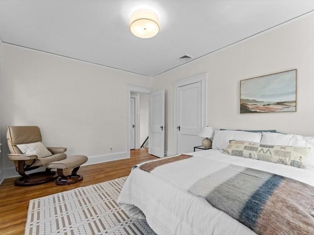 161 Playstead Rd, Medford, MA 02155 - bedroom featuring wood finished floors and baseboards