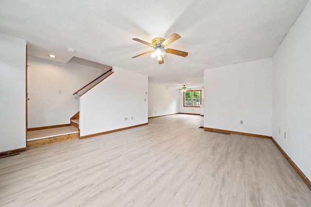 32-34 Lawn St, Attleboro, MA 02703 - unfurnished living room featuring ceiling fan, baseboards, stairway, and light wood finished floors