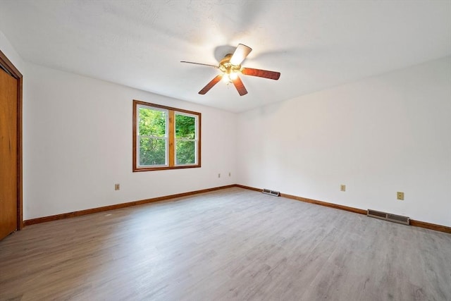 32-34 Lawn St, Attleboro, MA 02703 - empty room with wood finished floors, ceiling fan, and baseboards