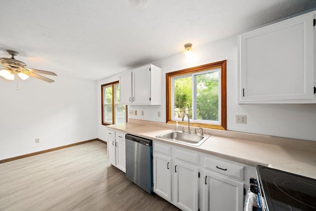 32-34 Lawn St, Attleboro, MA 02703 - kitchen featuring stainless steel dishwasher, a sink, light wood-style floors, and healthy amount of natural light