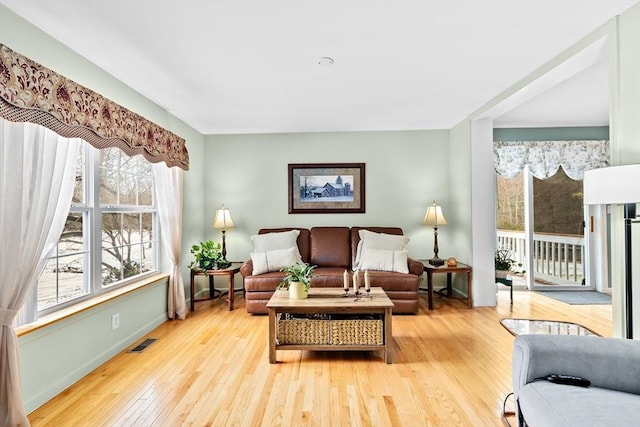 sitting room featuring light wood-type flooring