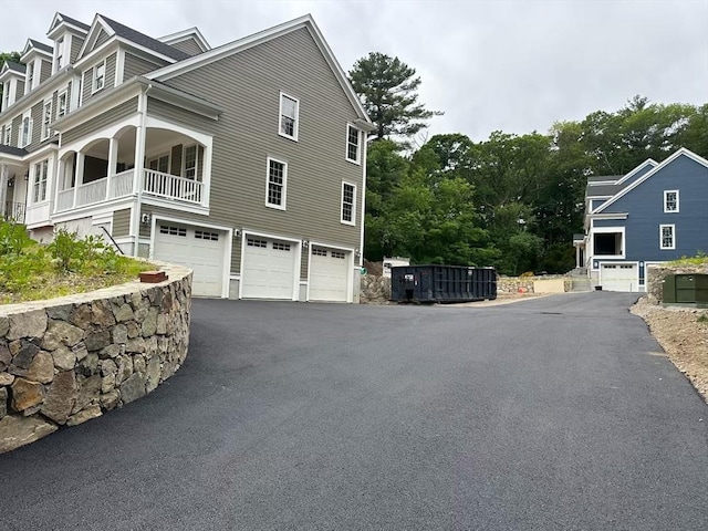 20 Shuttleworth, Dedham, MA 02026 - view of property exterior with a garage and driveway