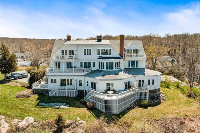 646 Jerusalem Rd Unit 7, Cohasset, MA 02025 - back of property featuring a balcony, a yard, and a chimney