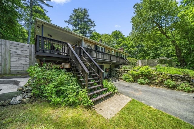 255 State St, Belchertown, MA 01007 - rear view of property with stairway and a deck