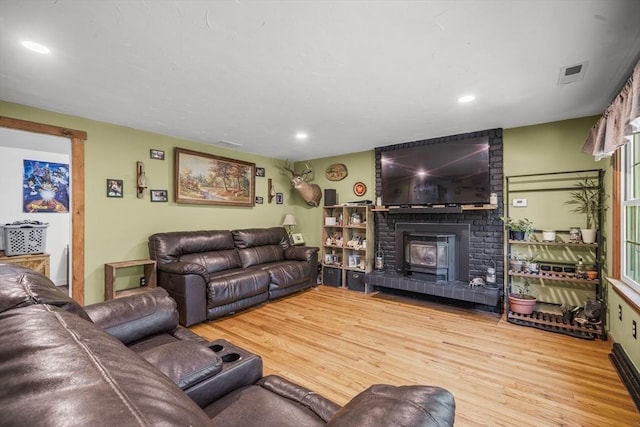255 State St, Belchertown, MA 01007 - living area with wood finished floors, a fireplace, and recessed lighting