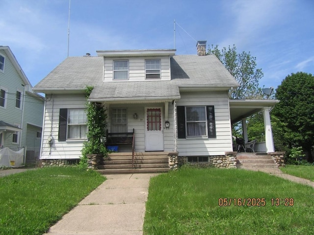 39 King St, Holyoke, MA 01040 - bungalow-style house with covered porch, a chimney, and a front lawn