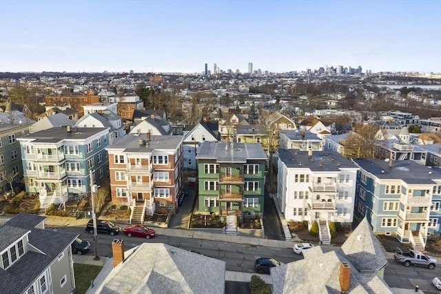 birds eye view of property with a residential view