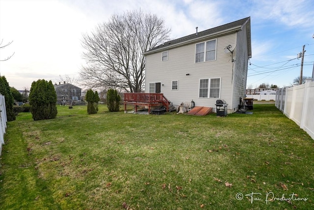 115 Arnold St, Fall River, MA 02724 - rear view of property featuring fence, a deck, and a lawn