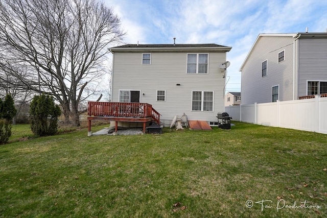 115 Arnold St, Fall River, MA 02724 - back of house with fence, a deck, and a lawn