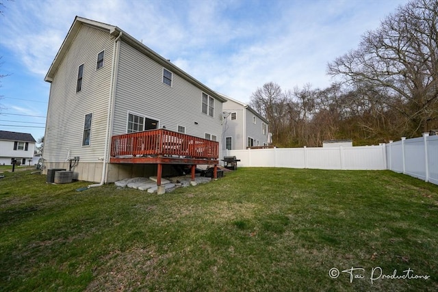 115 Arnold St, Fall River, MA 02724 - rear view of property featuring a deck, a yard, central air condition unit, and fence