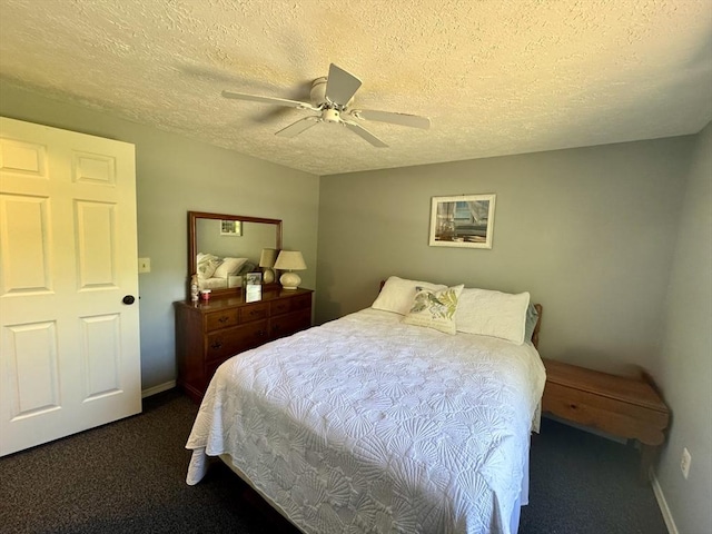 39 Pine Grove Rd, Yarmouth, MA 02664 - bedroom with dark carpet, a textured ceiling, baseboards, and ceiling fan