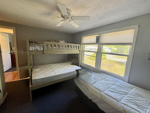 39 Pine Grove Rd, Yarmouth, MA 02664 - bedroom featuring a textured ceiling and ceiling fan