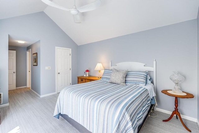 carpeted bedroom with baseboards, a ceiling fan, and lofted ceiling