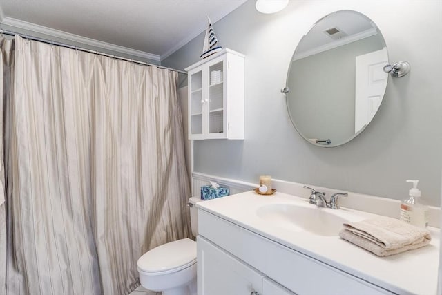 bathroom with toilet, visible vents, ornamental molding, and vanity
