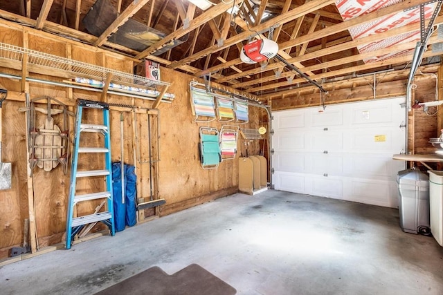 garage featuring a garage door opener