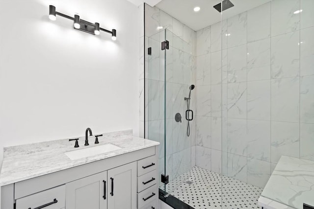 bathroom featuring vanity and walk in shower