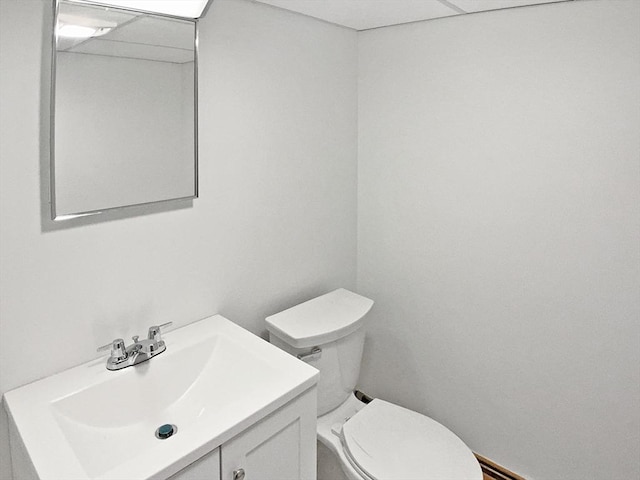 bathroom with toilet and vanity