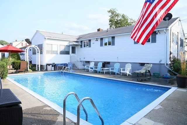 outdoor pool featuring entry steps