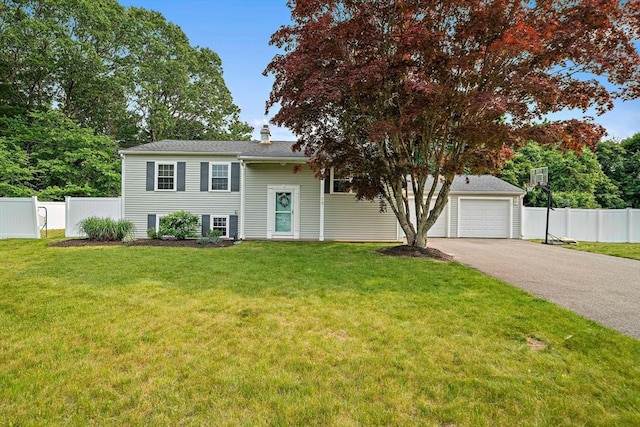 16 Chandler Dr, Marshfield, MA 02050 - raised ranch with asphalt driveway, a garage, and a chimney