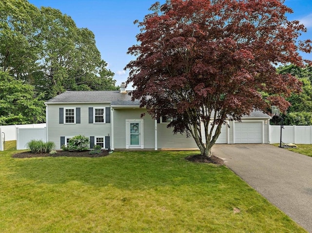 16 Chandler Dr, Marshfield, MA 02050 - view of front of home featuring asphalt driveway, a garage, and a chimney