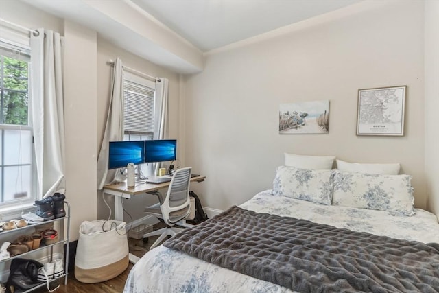 200 W 8th St Unit 1, Boston, MA 02127 - bedroom with wood finished floors, an office area, and baseboards