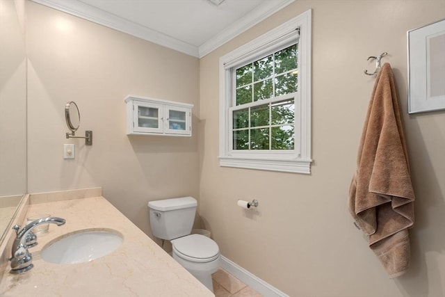 138 Worcester Ln, Waltham, MA 02451 - bathroom with ornamental molding, toilet, tile patterned flooring, vanity, and baseboards