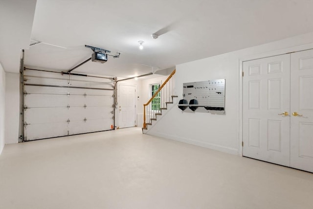 138 Worcester Ln, Waltham, MA 02451 - garage featuring a garage door opener