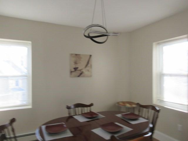 dining room with plenty of natural light