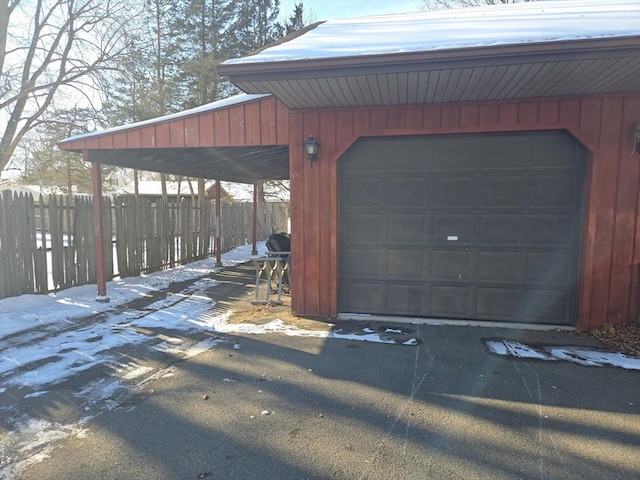 view of snow covered garage