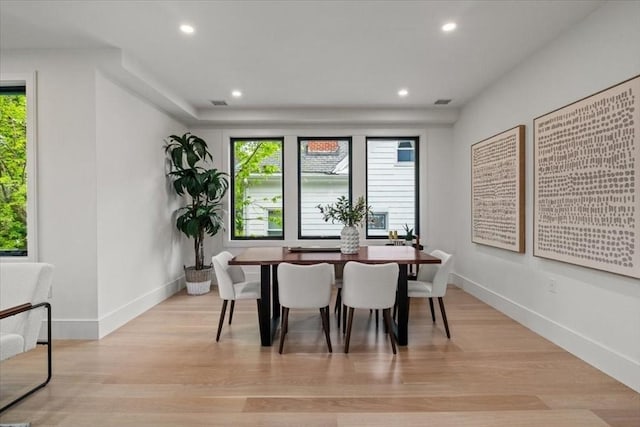 116 Thorndike Rd, Brookline, MA 02446 - dining area with light wood-style flooring and recessed lighting