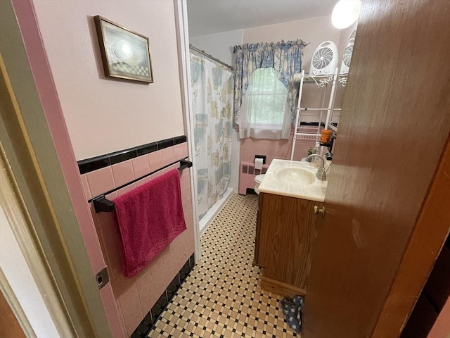 45 Leonard St, Dedham, MA 02026 - bathroom with tile walls, vanity, wainscoting, a shower with curtain, and tile patterned floors