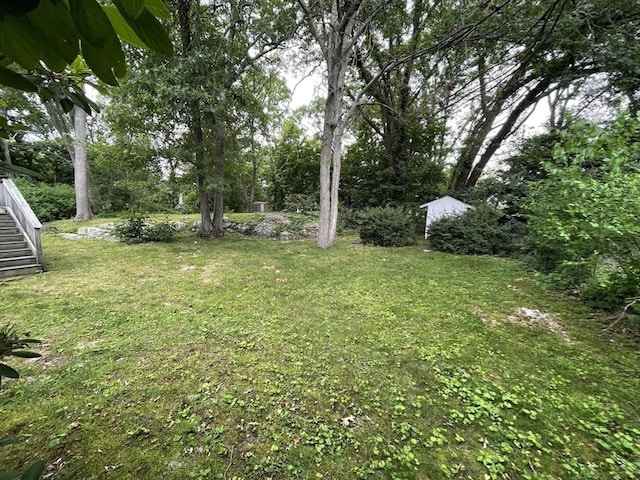 45 Leonard St, Dedham, MA 02026 - view of grassy yard with stairs