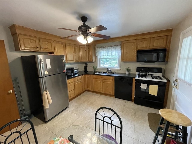 45 Leonard St, Dedham, MA 02026 - kitchen featuring black appliances, ceiling fan, light tile patterned floors, and dark countertops