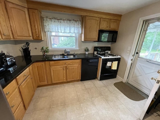 45 Leonard St, Dedham, MA 02026 - kitchen with black appliances, tasteful backsplash, dark countertops, and light tile patterned floors