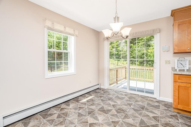 380 Leo Dr, Gardner, MA 01440 - unfurnished dining area with a baseboard heating unit, healthy amount of natural light, and a chandelier