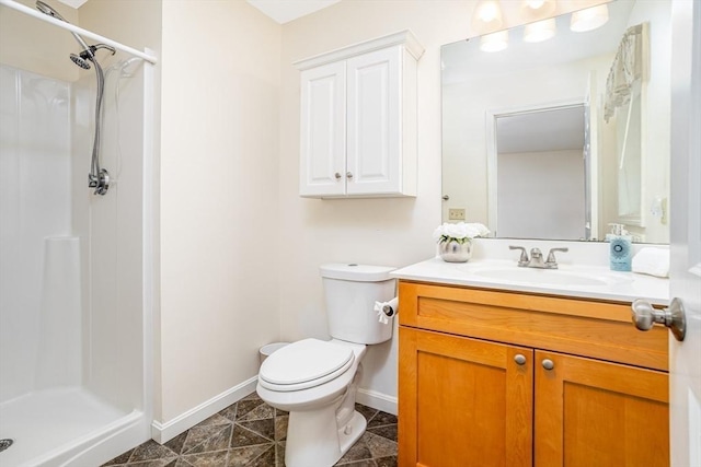 380 Leo Dr, Gardner, MA 01440 - full bath with baseboards, a walk in shower, vanity, and toilet