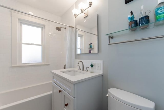 full bathroom with vanity, toilet, and shower / bath combo with shower curtain