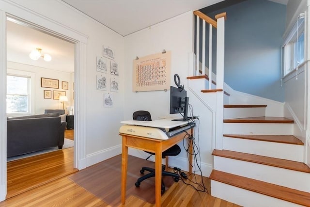 office featuring baseboards and wood finished floors